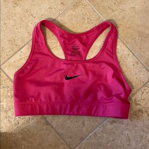 Deep pink Nike racer back sports bra